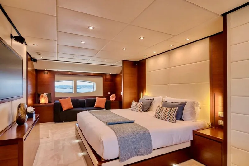  Yacht Photos Pics Luxurious bedroom interior on 2007 Baglietto 43 yacht, featuring elegant decor and modern amenities.