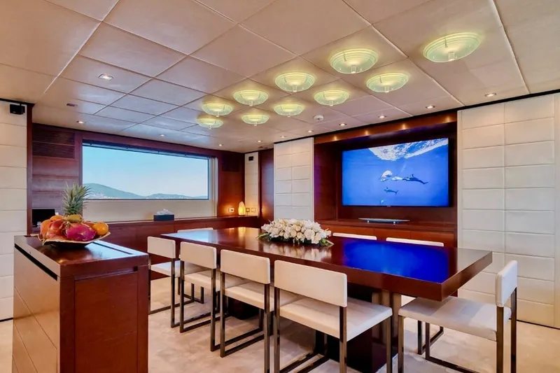  Yacht Photos Pics Luxurious dining area on 2007 Baglietto 43 yacht with elegant decor and ocean view.