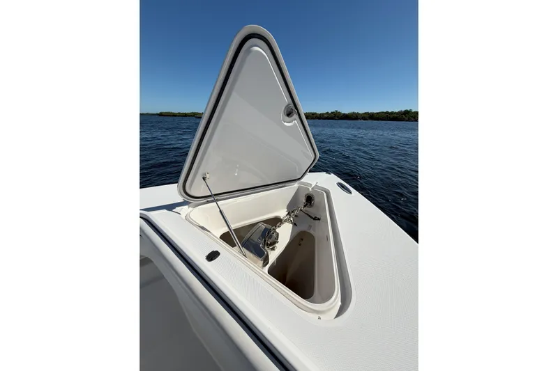 Huddle Up Yacht Photos Pics Open anchor hatch on 2018 Jupiter 38 FS boat, with ocean view.