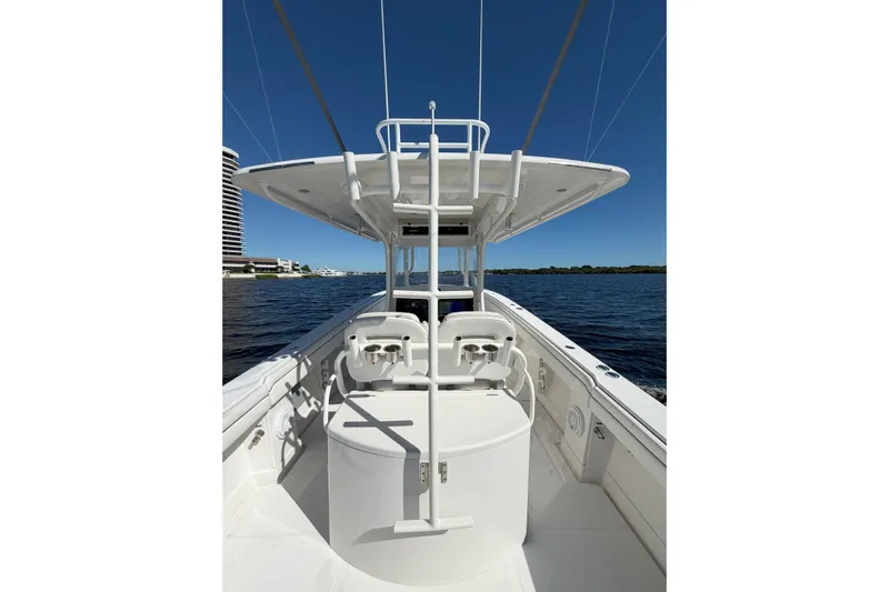 Huddle Up Yacht Photos Pics 2018 Jupiter 38 FS boat on water, featuring sleek design and spacious deck.