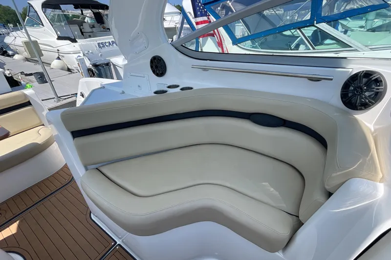  Yacht Photos Pics 2017 Rinker EX 370 boat interior with beige seating and speaker system.