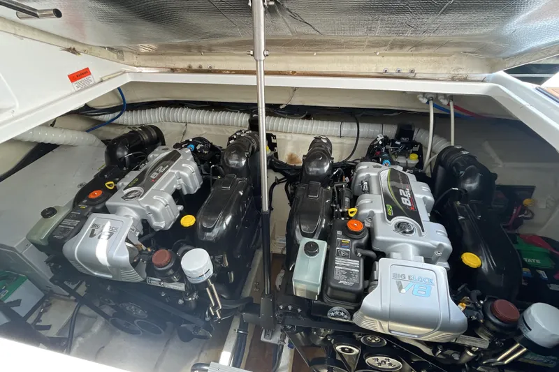  Yacht Photos Pics 2017 Rinker EX 370 engine compartment with dual V8 engines, showcasing powerful marine performance.