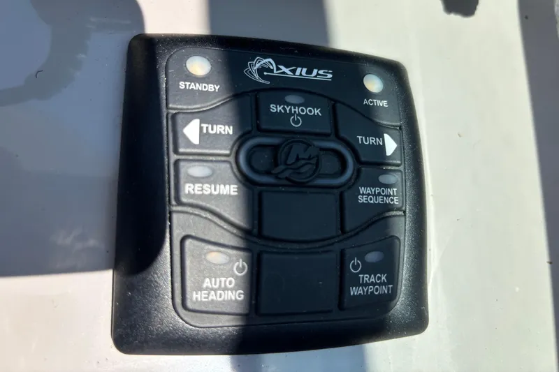  Yacht Photos Pics Control panel of a 2017 Rinker EX 370 boat featuring Axius system buttons.