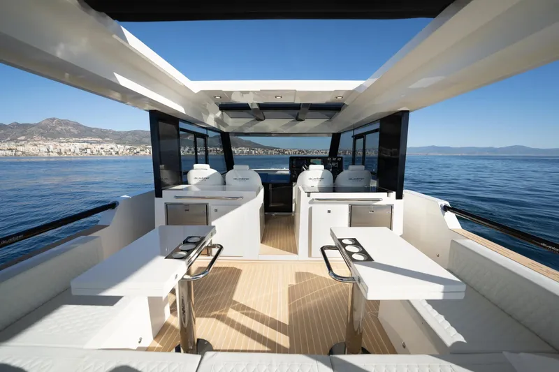  Yacht Photos Pics Luxurious 2026 De Antonio Yachts D50 interior with sleek design and ocean view.
