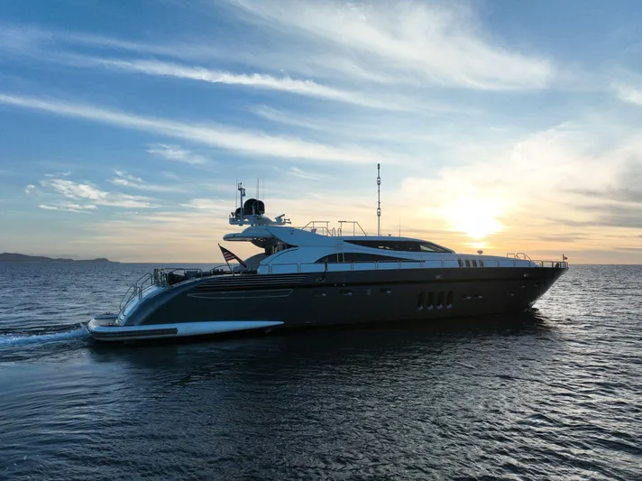 Go Yacht Photos Pics Luxury Leopard 34 yacht cruising at sunset, 2008 model, serene ocean view.
