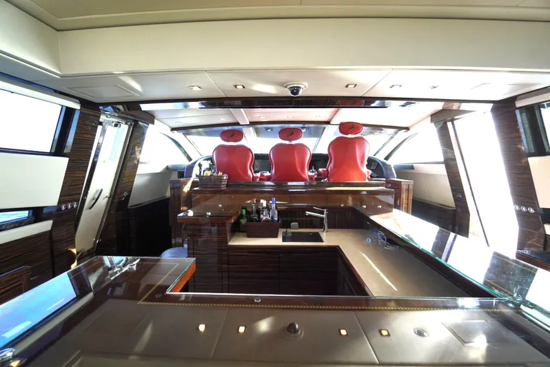 Go Yacht Photos Pics Luxurious interior of 2008 Leopard 34 yacht with sleek design and red seating.