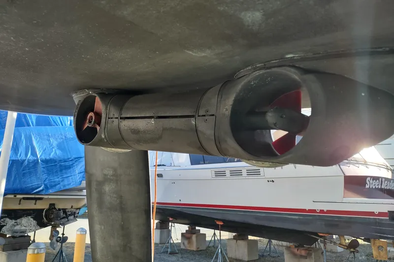 Indigo Sea Yacht Photos Pics Close-up of a 2018 Beneteau Sense 57 yacht's propeller and hull in a boatyard.