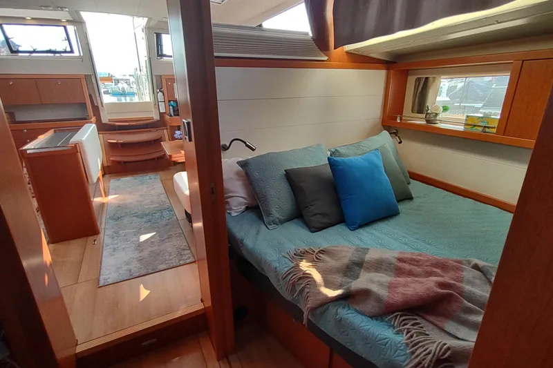 Indigo Sea Yacht Photos Pics Luxurious interior of 2018 Beneteau Sense 57 yacht with cozy bedroom and modern design.