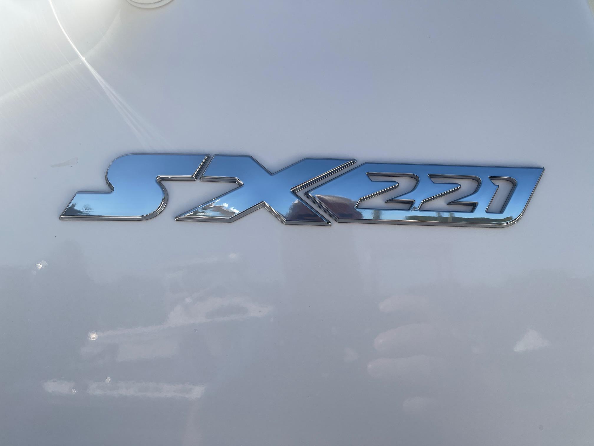 2025 Skeeter SX221 logo on a sleek, reflective surface.