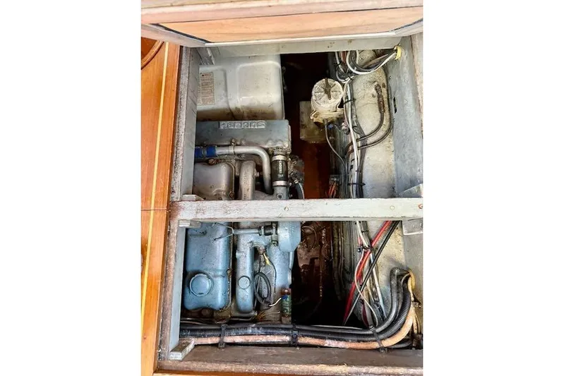 Mavi Yacht Photos Pics Engine compartment of a 1991 Oyster 49 sailboat, featuring a Perkins engine.