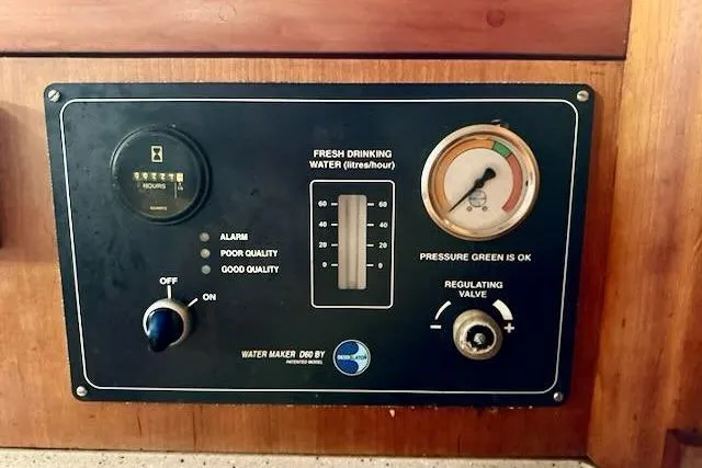 Mavi Yacht Photos Pics Control panel of a 1991 Oyster 49 water maker, showing pressure and quality indicators.