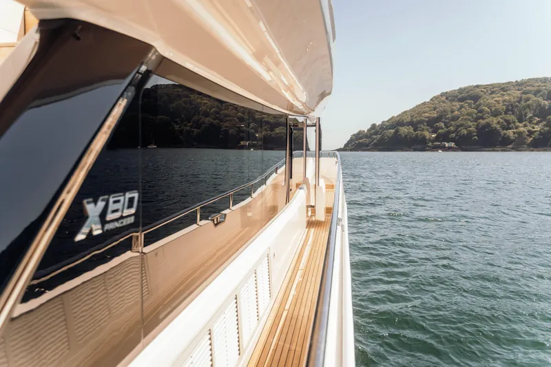 Chase Yacht Photos Pics Luxury Princess X80 yacht cruising on serene waters, 2023 model.