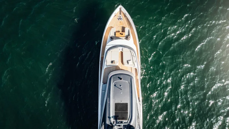 Chase Yacht Photos Pics Aerial view of 2023 Princess X80 yacht cruising on open water.