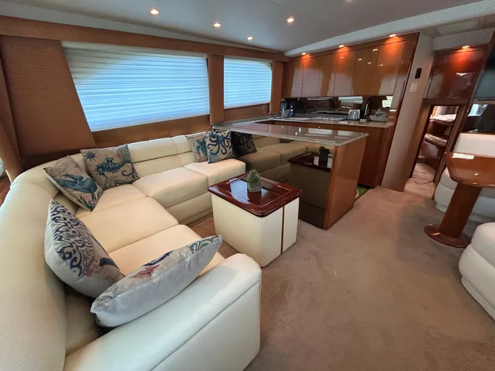  Yacht Photos Pics Luxurious interior of a 2004 Viking 48C yacht with plush seating and elegant decor.