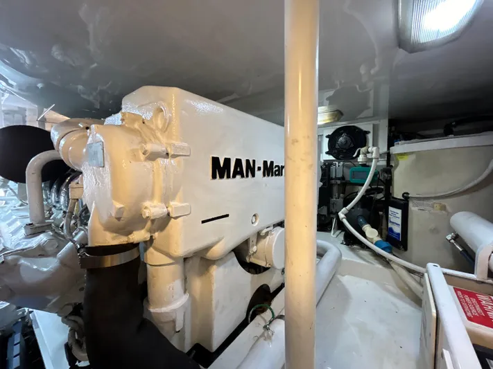  Yacht Photos Pics Engine room of 2004 Viking 48C yacht featuring a MAN engine.