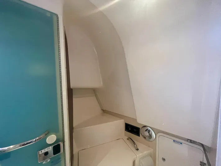 Hobi One Yacht Photos Pics Interior cabin of 2015 Pursuit 345 Offshore boat, featuring sleek design and modern amenities.