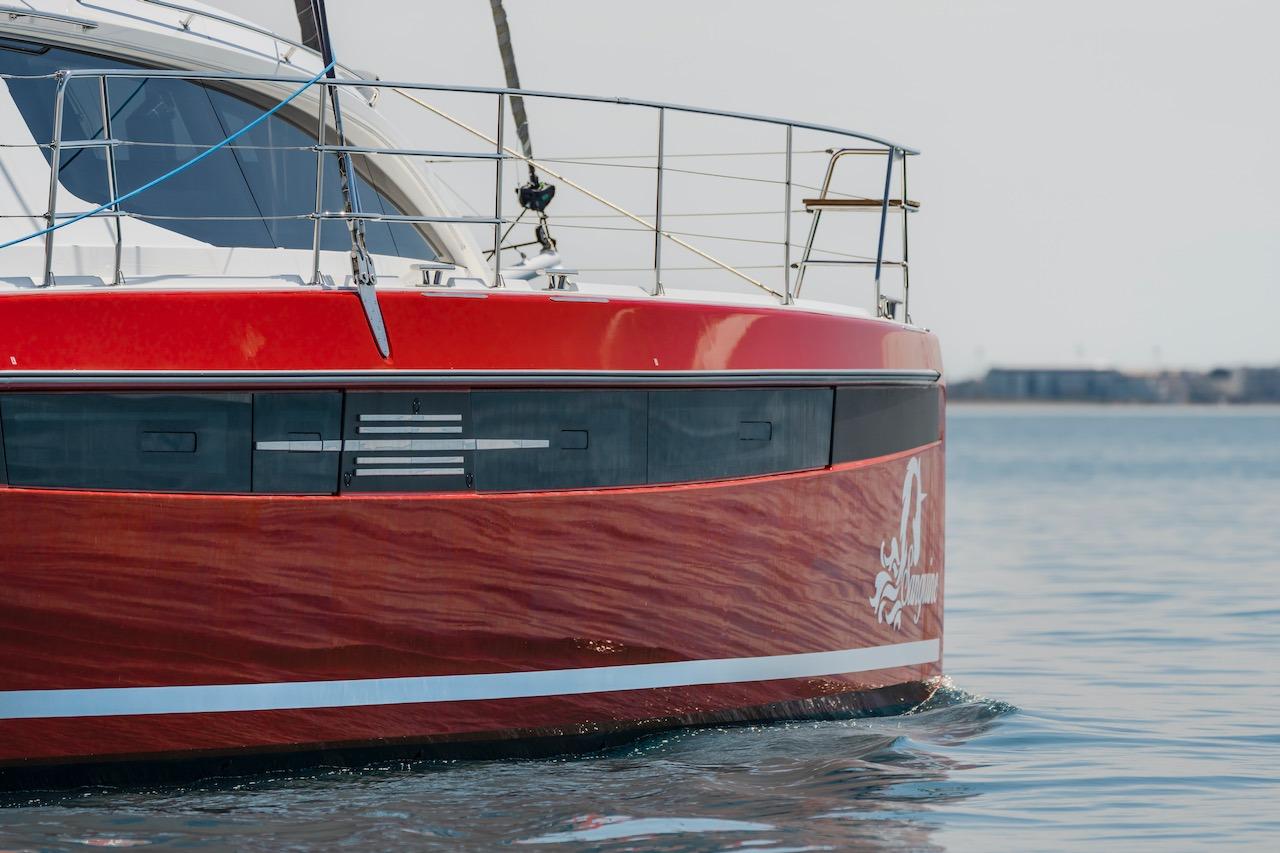 Red Privilege Signature 510 yacht from 2025 on calm water.