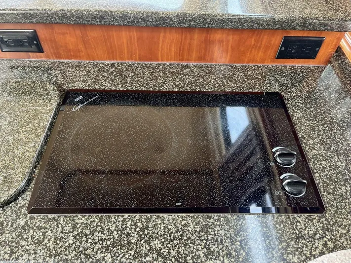  Yacht Photos Pics Stovetop on 2005 Cruisers Yachts 405 Express Motor Yacht with granite countertop.