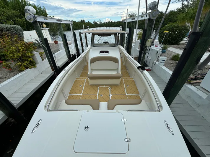  Yacht Photos Pics Mamba 350 boat, 2009 model, docked with spacious seating and sleek design.