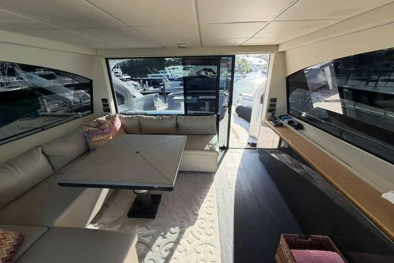  Yacht Photos Pics Luxurious interior of 2015 Pershing 70 yacht with elegant seating and modern design.