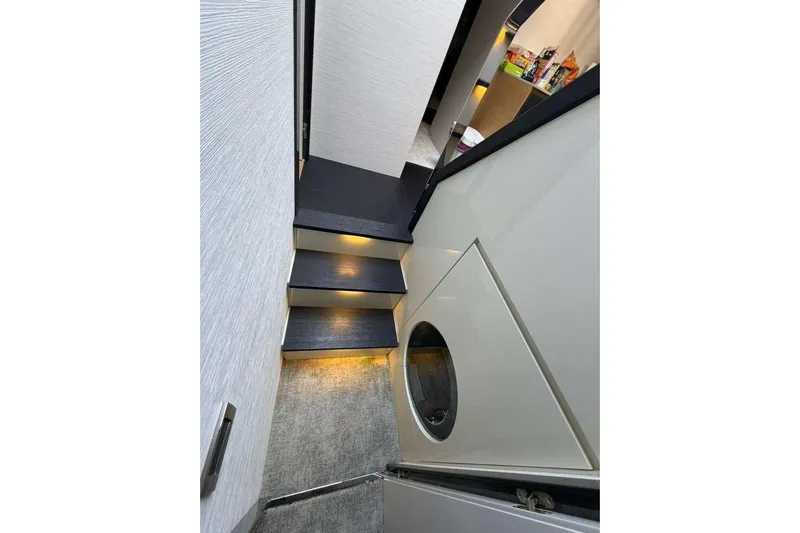  Yacht Photos Pics Staircase with ambient lighting inside 2015 Pershing 70 yacht interior.