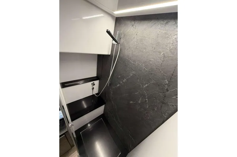  Yacht Photos Pics Luxurious bathroom interior of 2015 Pershing 70 yacht with sleek modern design.