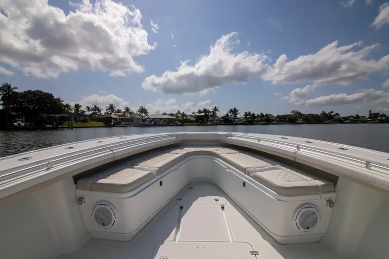 Kat Man Du Yacht Photos Pics 2017 Yellowfin 39 Center Console boat with cushioned seating and scenic water view.