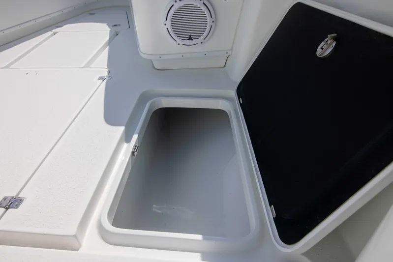 Kat Man Du Yacht Photos Pics 2017 Yellowfin 39 Center Console storage compartment and speaker.