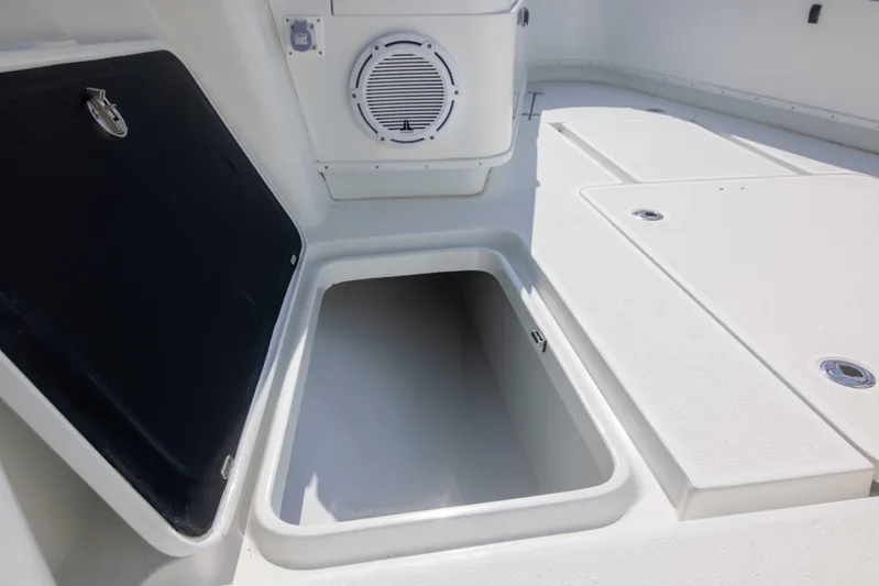 Kat Man Du Yacht Photos Pics 2017 Yellowfin 39 Center Console storage compartment and speaker.