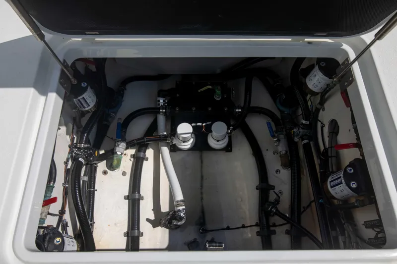 Kat Man Du Yacht Photos Pics 2017 Yellowfin 39 Center Console engine compartment with various mechanical components.