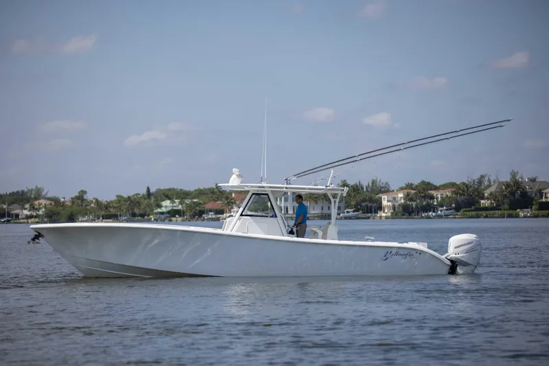 Kat Man Du Yacht Photos Pics 2017 Yellowfin 39 Center Console boat on calm water.