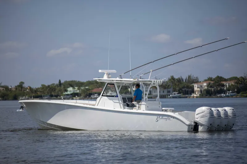 Kat Man Du Yacht Photos Pics 2017 Yellowfin 39 Center Console boat on calm water.