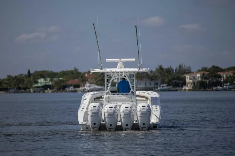 Kat Man Du Yacht Photos Pics 2017 Yellowfin 39 Center Console boat with four outboard engines on the water.