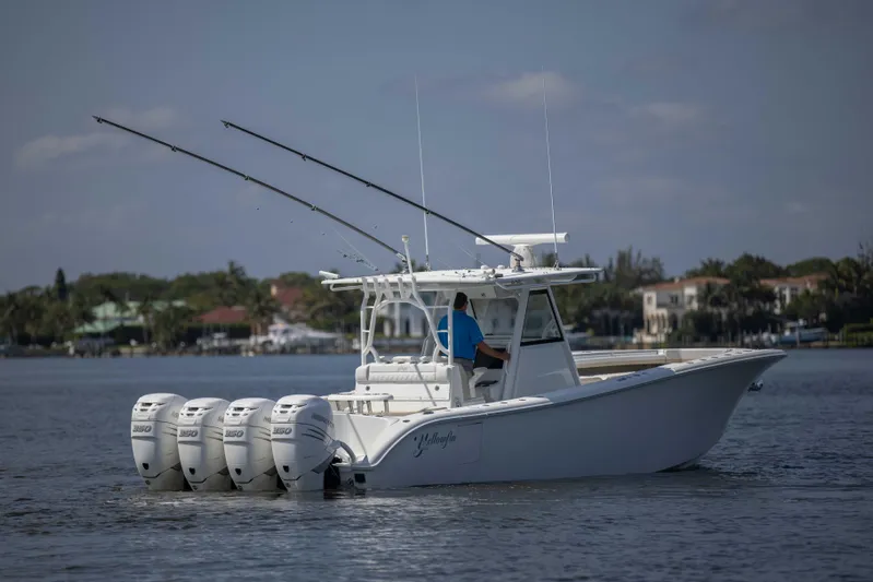 Kat Man Du Yacht Photos Pics 2017 Yellowfin 39 Center Console boat with four outboard engines on the water.