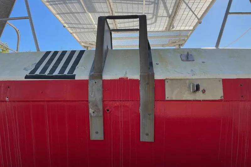 Asi Tender Yacht Photos Pics Red and white buoy tender hull with metal ladder, 1987 commercial model.