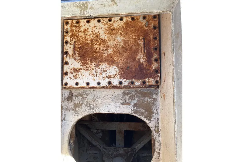 Asi Tender Yacht Photos Pics Rusty metal surface on 1987 commercial buoy tender, showing wear and weathering.