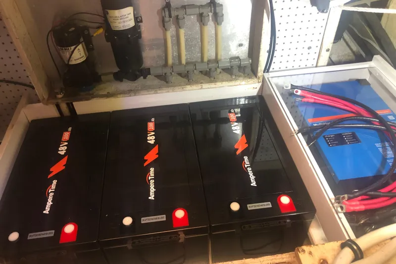 Windfall Yacht Photos Pics Electrical setup with Ampere Time 48V batteries and inverter in 1999 Caliber 40LRC.