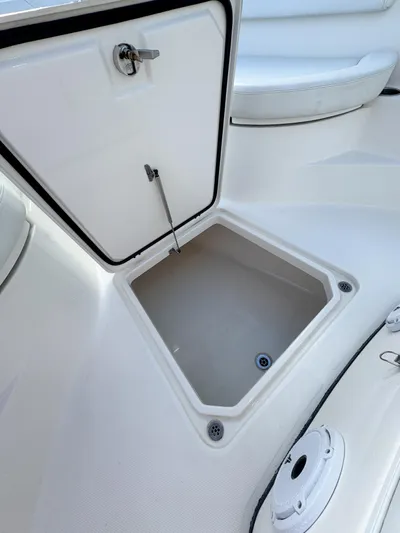  Yacht Photos Pics Open storage compartment on a 2013 Edgewater 318CC boat.