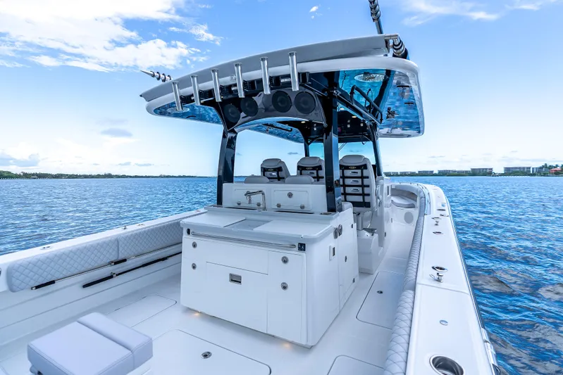 Seakeeper Equipped Yacht Photos Pics 2024 HCB 42 Lujo boat on water, featuring sleek design and modern amenities.