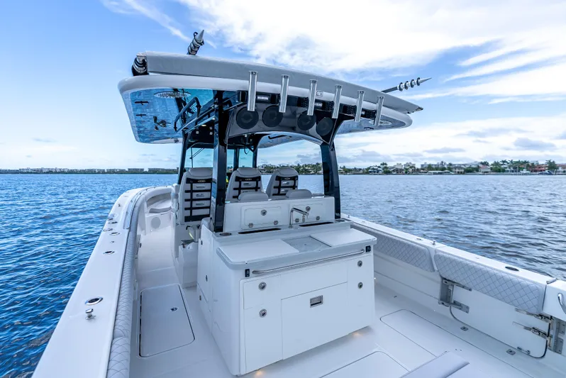 Seakeeper Equipped Yacht Photos Pics 2024 HCB 42 Lujo boat on calm water, featuring sleek design and modern amenities.