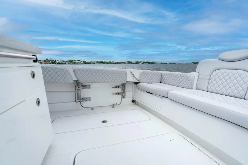 Seakeeper Equipped Yacht Photos Pics Luxurious seating on 2024 HCB 42 Lujo boat with ocean view.