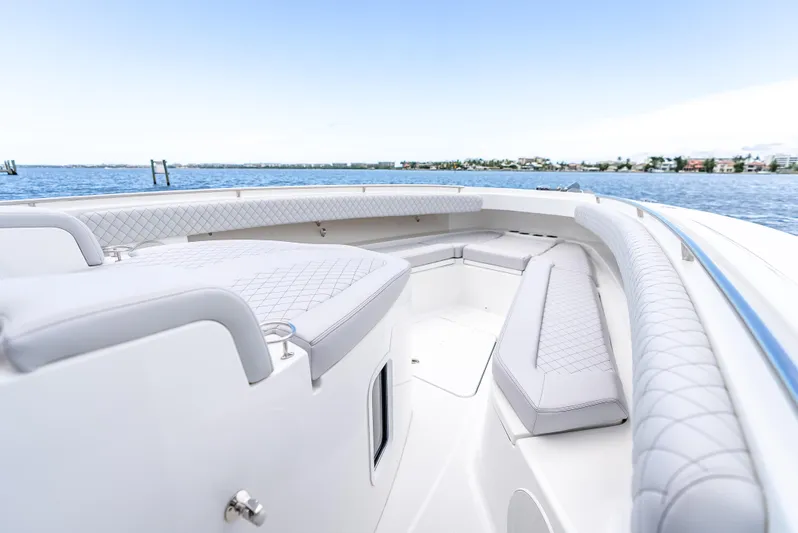 Seakeeper Equipped Yacht Photos Pics 2024 HCB 42 Lujo boat interior with luxurious seating and ocean view.