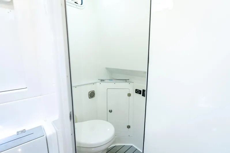 Seakeeper Equipped Yacht Photos Pics 2024 HCB 42 Lujo boat bathroom interior with modern white design.