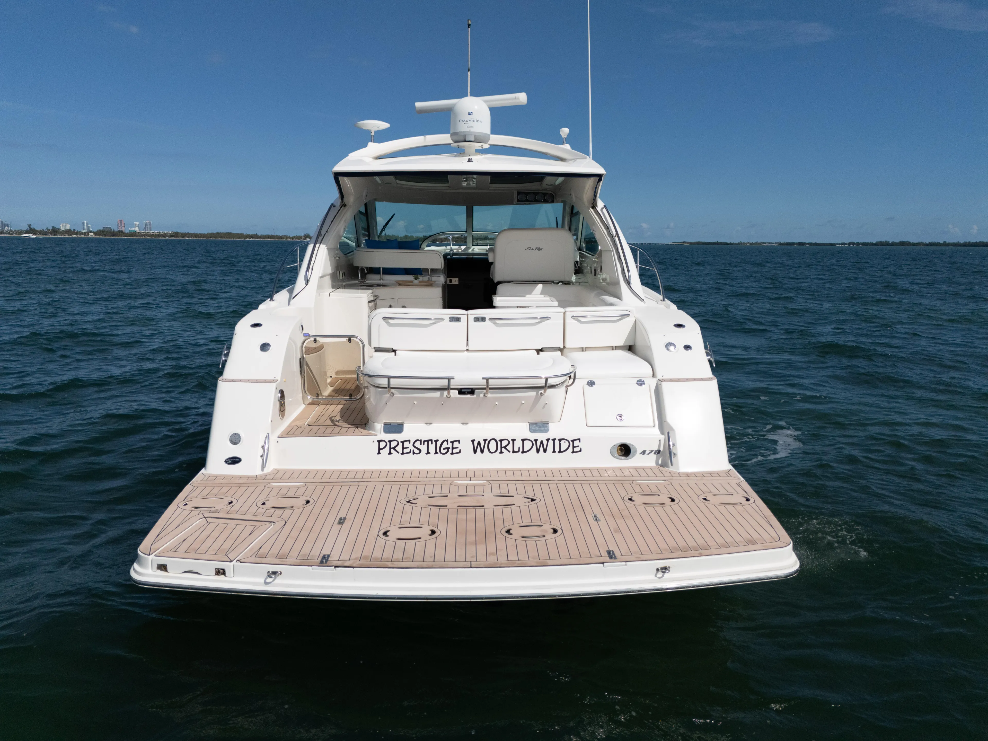  Yacht Photos Pics 2011 Sea Ray 470 Sundancer yacht on open water, rear view.