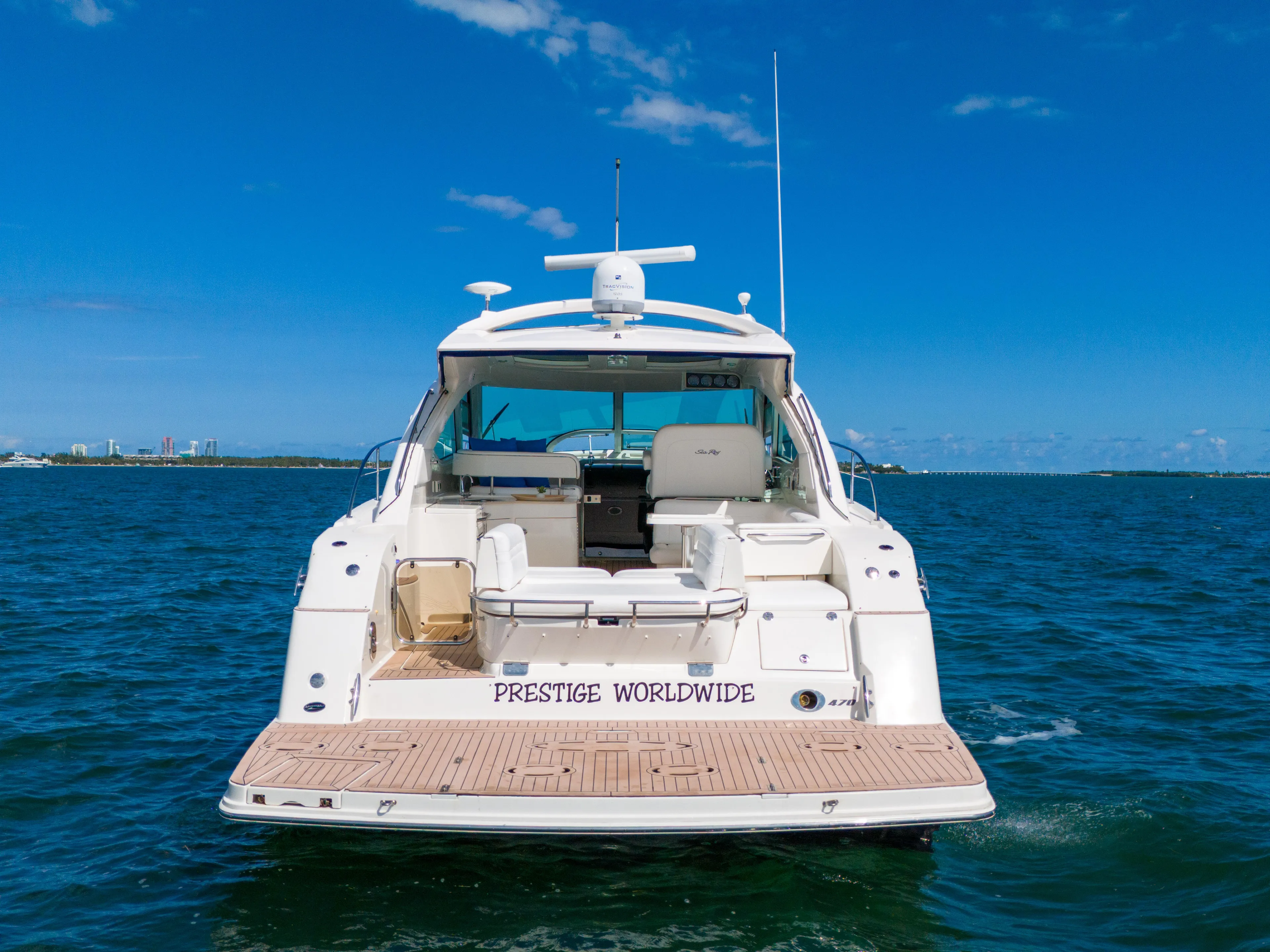  Yacht Photos Pics 2011 Sea Ray 470 Sundancer yacht on open water, rear view.