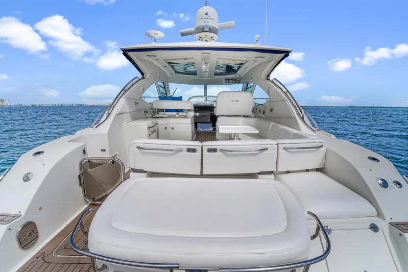  Yacht Photos Pics 2011 Sea Ray 470 Sundancer yacht with spacious deck and ocean view.
