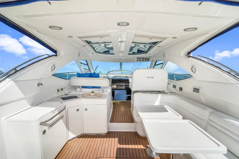  Yacht Photos Pics Interior of 2011 Sea Ray 470 Sundancer yacht with modern design and wooden flooring.