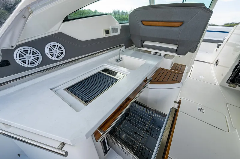  Yacht Photos Pics 2021 Tiara Yachts 38 LX interior with sleek kitchen and modern amenities.