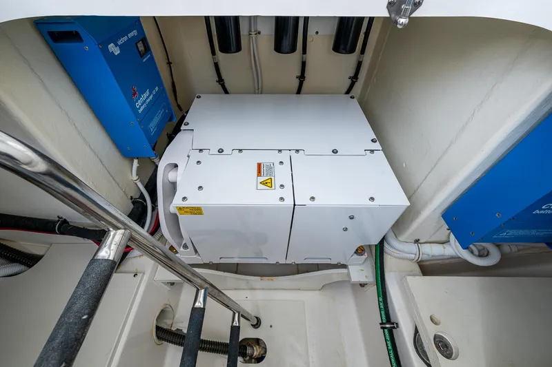  Yacht Photos Pics Engine compartment of 2021 Tiara Yachts 38 LX, featuring electrical components and wiring.