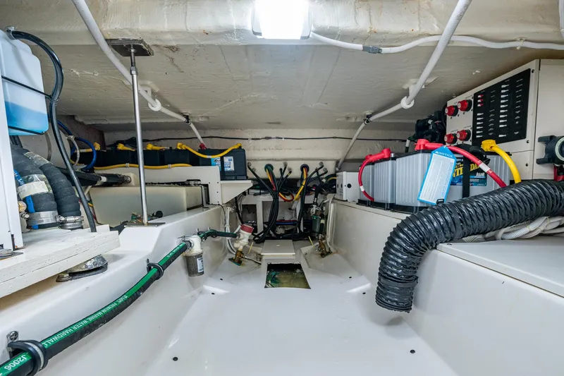  Yacht Photos Pics Engine room of 2021 Tiara Yachts 38 LX, showcasing wiring and equipment.